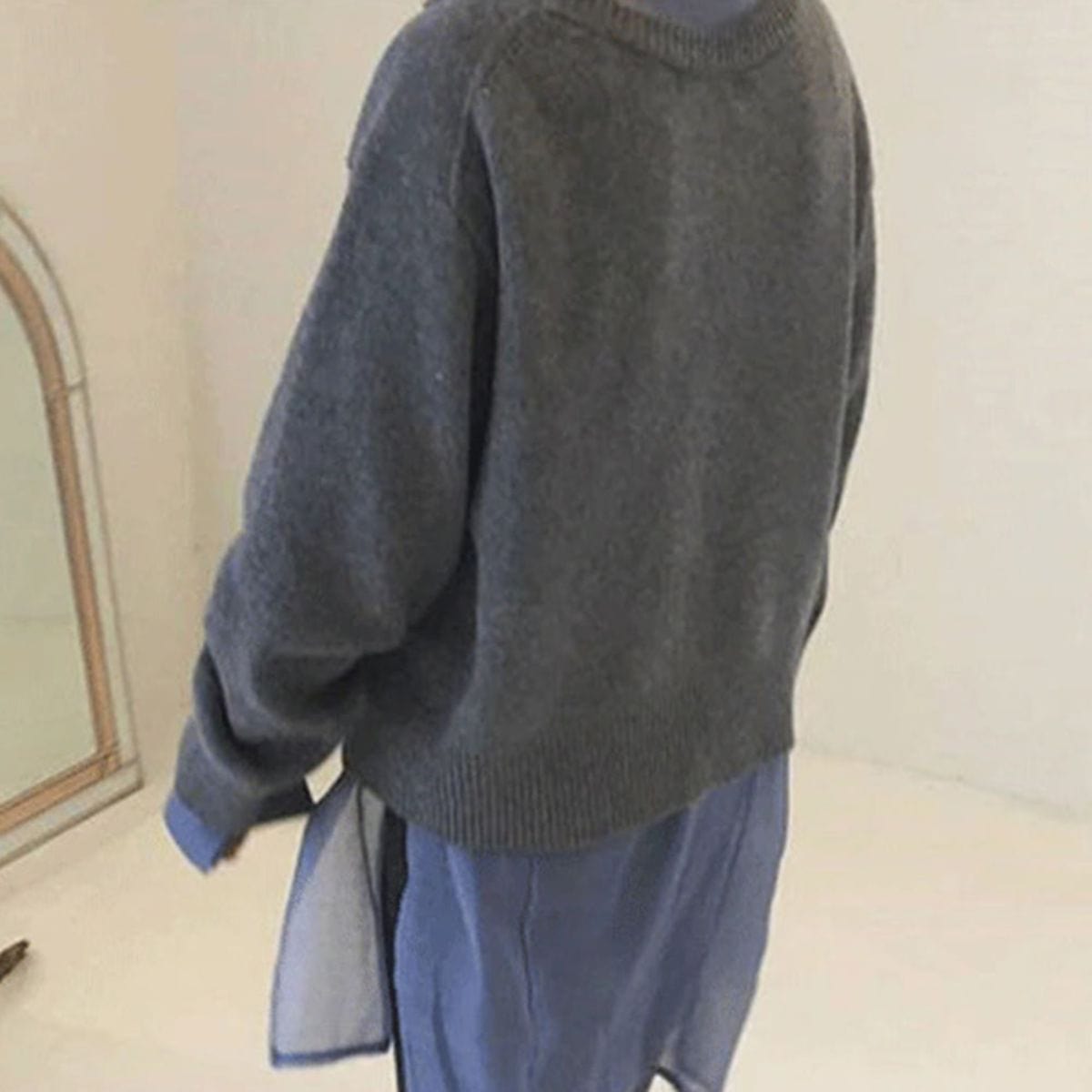 Ladies cardigan with asymmetric buttons