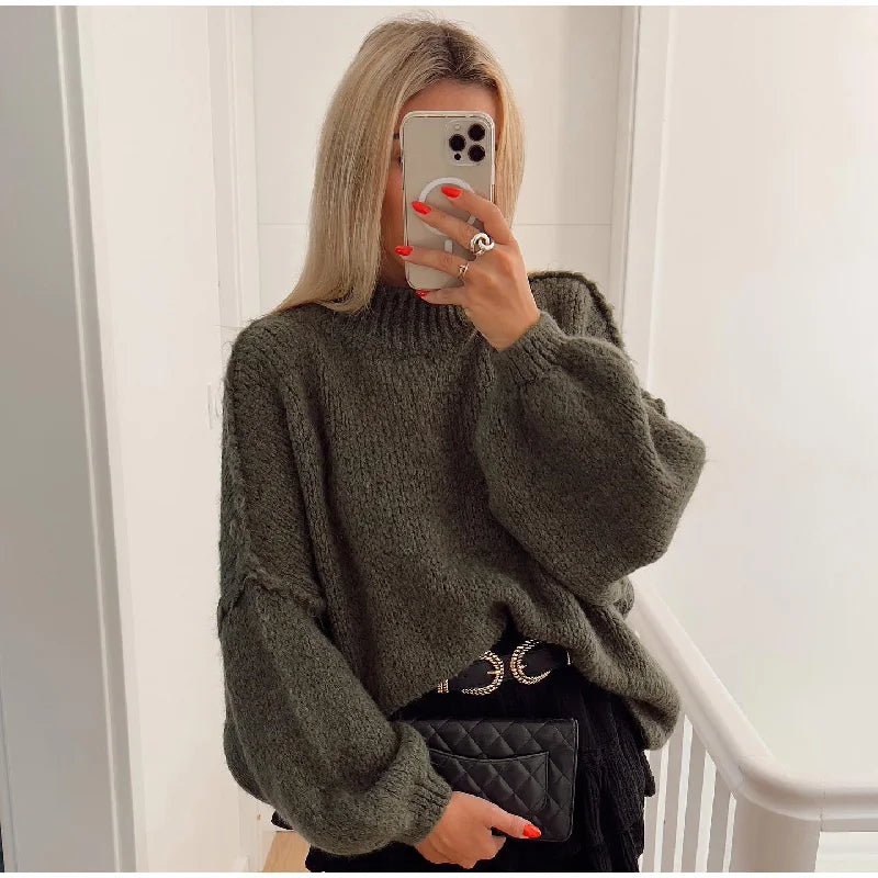 Oversized knitted jumper for women with stand-up collar