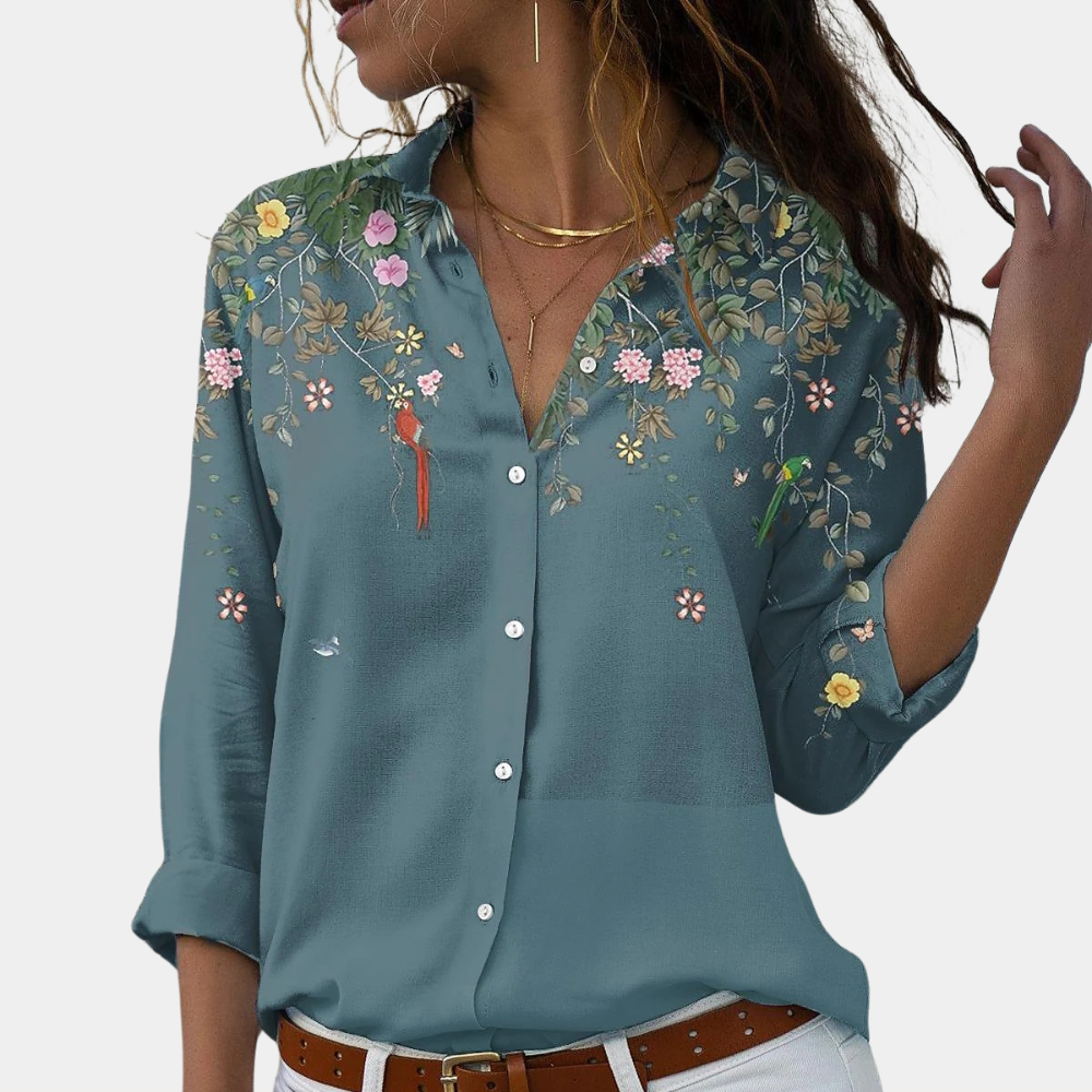Women's blouse with floral embroidery and puff sleeves