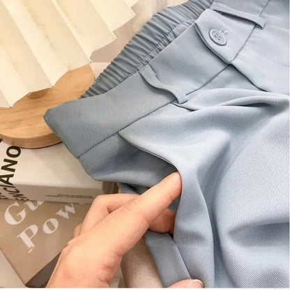 Elasticated women's high-waisted trousers