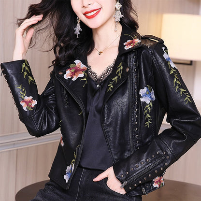 Embroidered leather style jacket with floral print