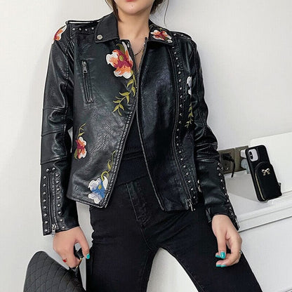 Embroidered leather style jacket with floral print