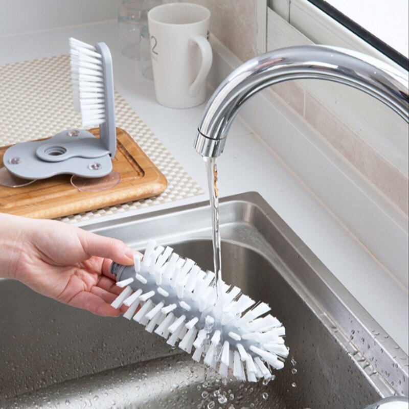 Glass cleaner with double-sided brush