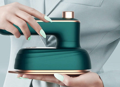 Hand iron with steam