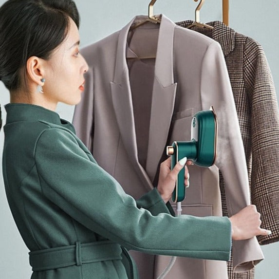 Hand iron with steam