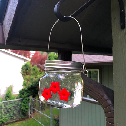 Hummingbird feeder with gate flower