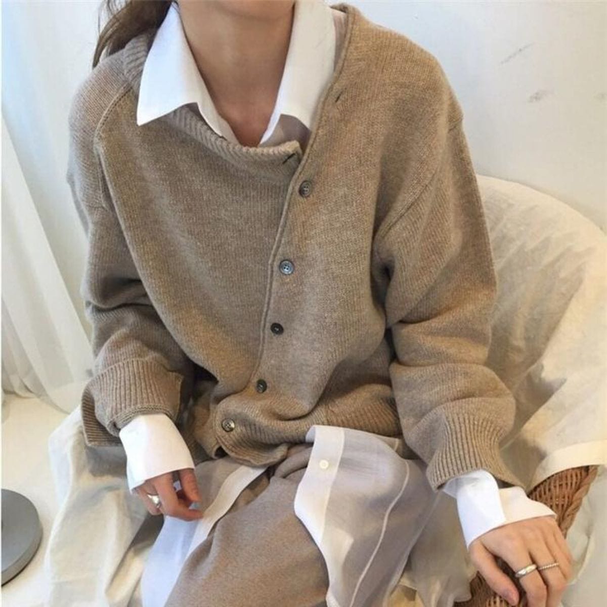 Ladies cardigan with asymmetric buttons
