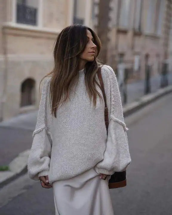 Oversized knitted jumper for women with stand-up collar