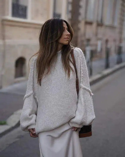 Oversized knitted jumper for women with stand-up collar