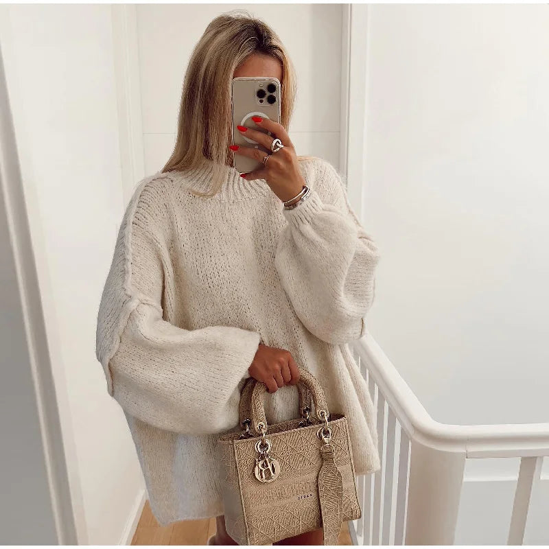 Oversized knitted jumper for women with stand-up collar