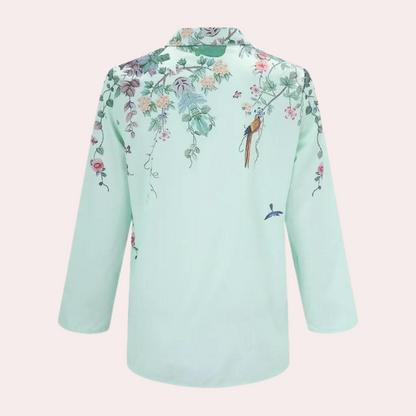 Women's blouse with floral embroidery and puff sleeves