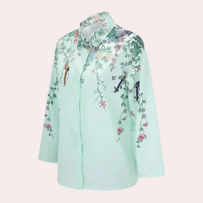 Women's blouse with floral embroidery and puff sleeves