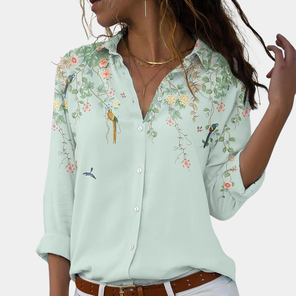 Women's blouse with floral embroidery and puff sleeves