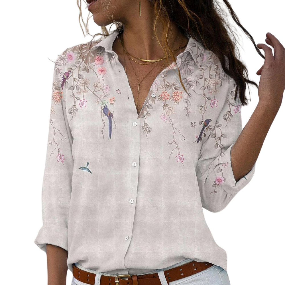 Women's blouse with floral embroidery and puff sleeves