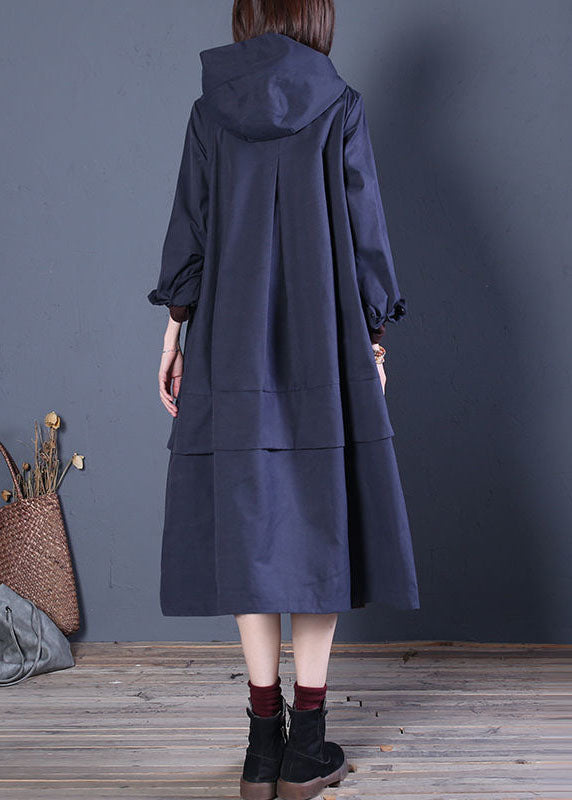 Women's hooded trench coat with zip fastening
