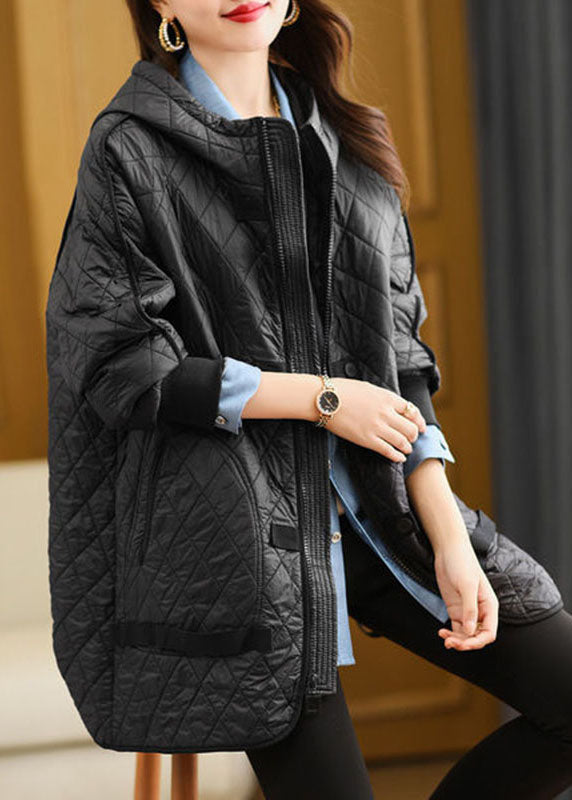 Women's quilted jacket with hood and zip